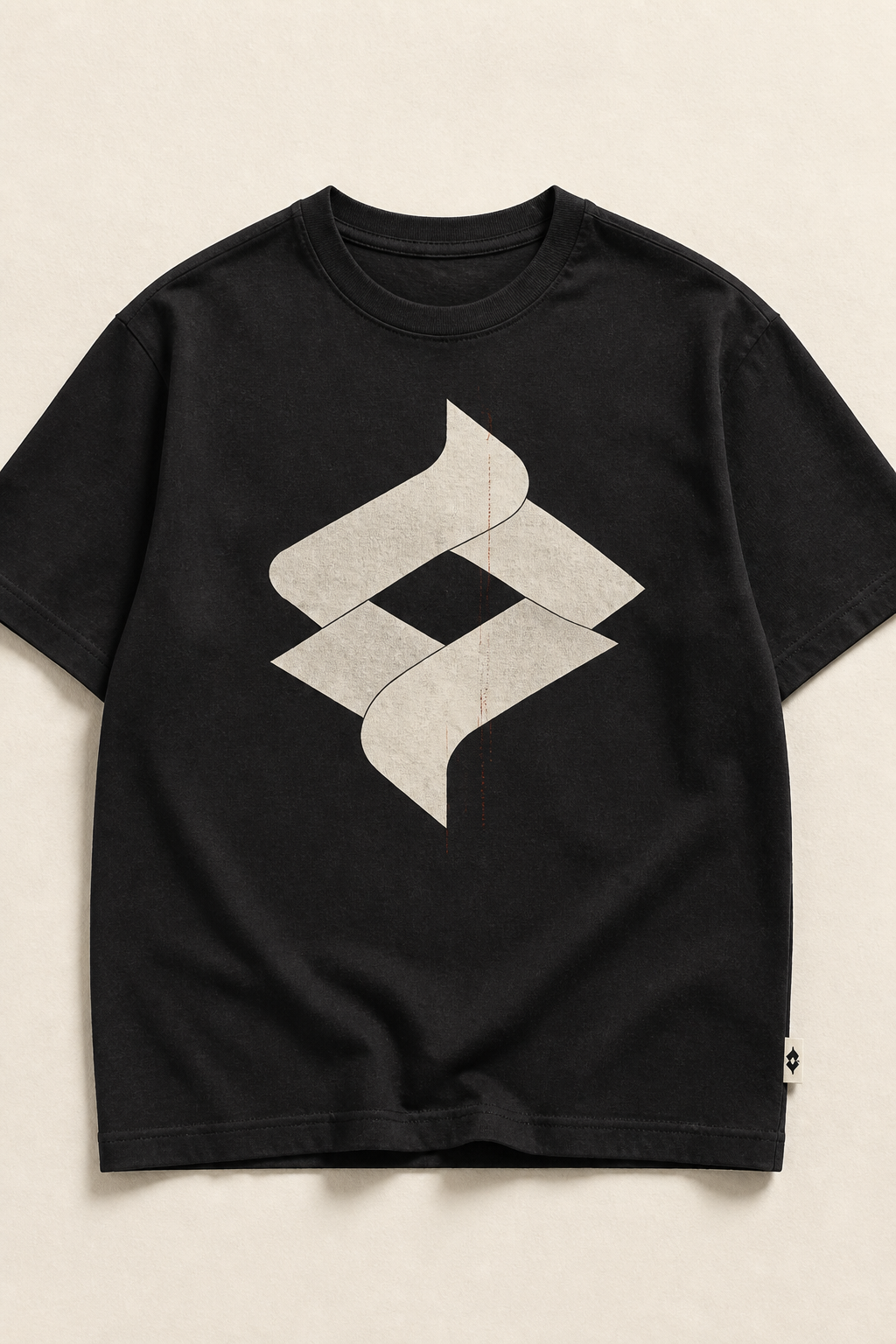 Me&yours The Interval tee — textured stone fold mark on a washed black shirt